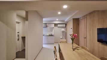 Apartment, 2 Bedrooms | Private kitchen | Fridge, electric kettle, highchair, cookware/dishes/utensils