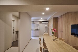 Apartment, 2 Bedrooms | Private kitchen | Fridge, electric kettle, highchair, cookware/dishes/utensils