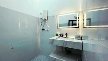 Shower, hydromassage showerhead, designer toiletries, hair dryer