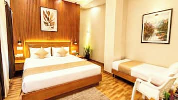 Kamar Triple Deluks, AC | Seprai antialergi, meja kerja, kedap suara, dan Wi-Fi gratis
