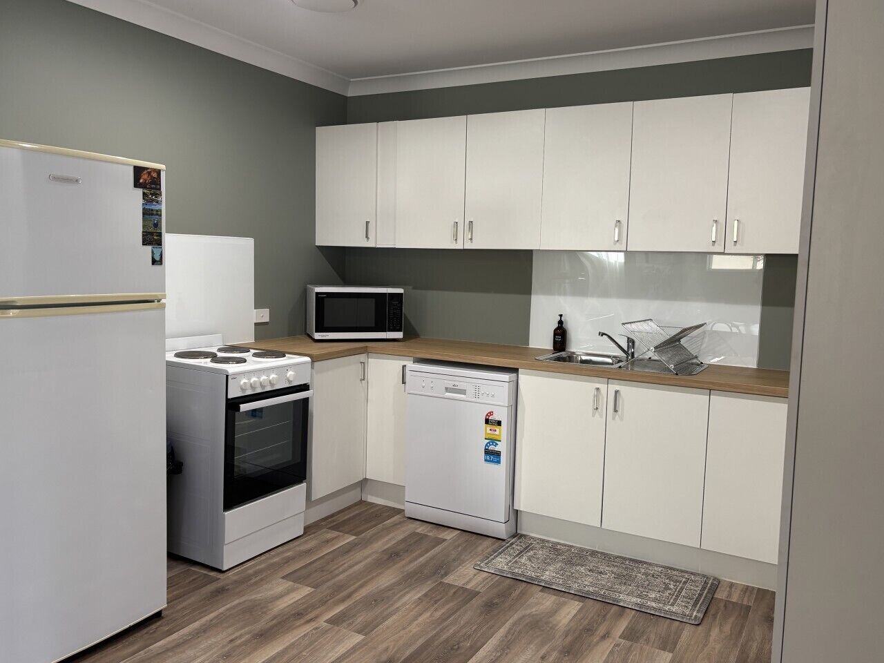 Full size fridge, oven, dishwasher and microwave