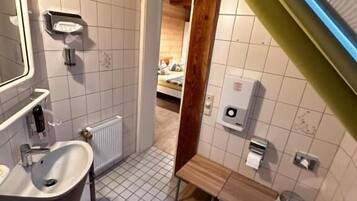 Apartment, Balcony, Garden View | Bathroom | Bathtub, hair dryer, towels, soap