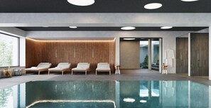 A modern indoor pool area with lounge chairs, a wooden wall, and a glass door leading outside.