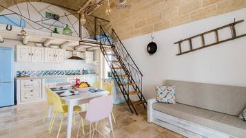Deluxe Villa, Patio, Garden View | Living area