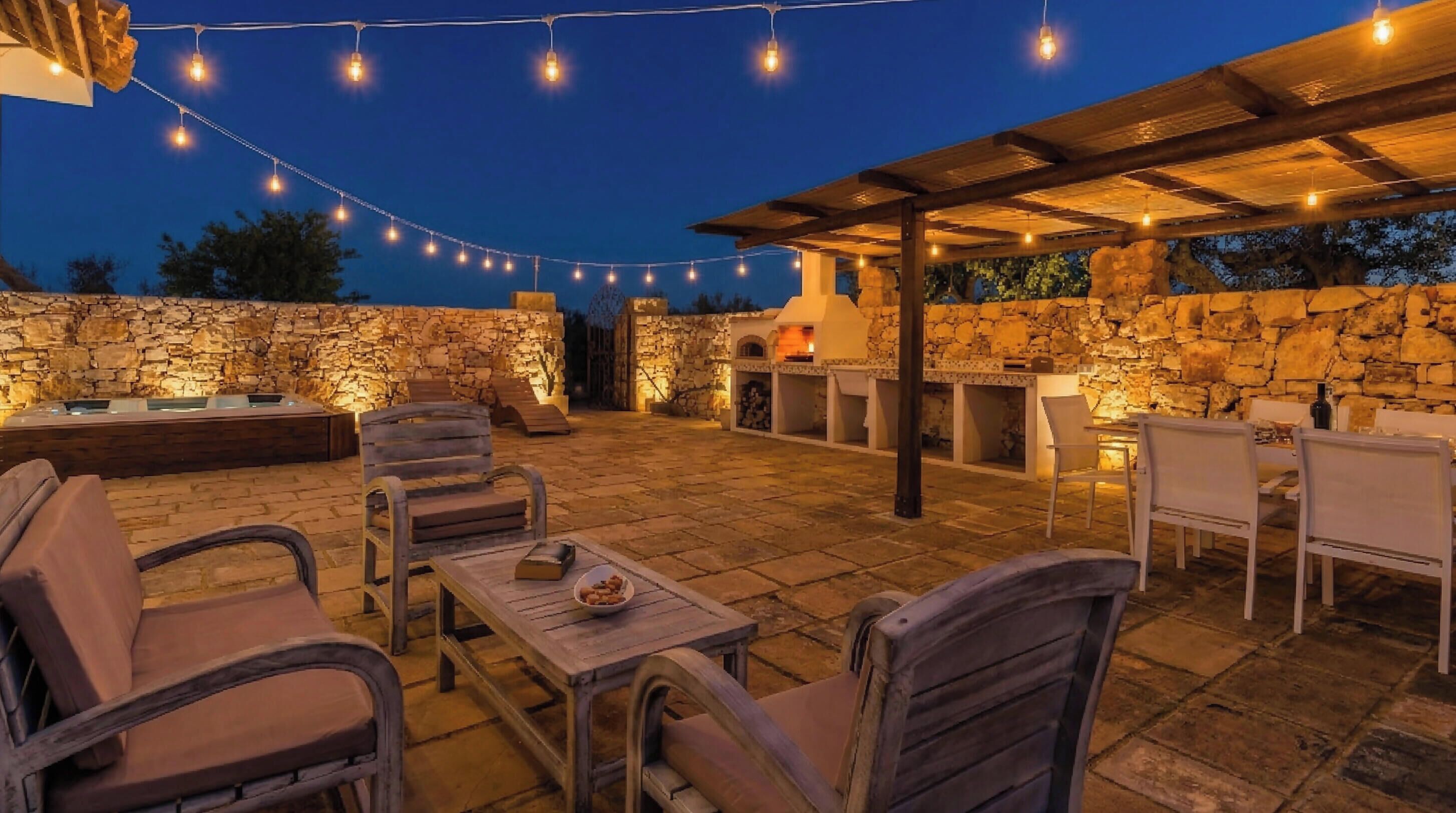Villa Deluxe, patio, vista giardino | Ristorazione all'aperto