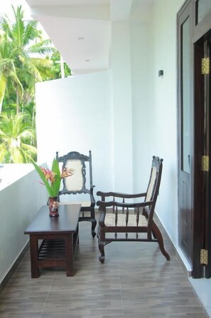 Habitación Deluxe doble, balcón, vistas al jardín | Terraza o patio