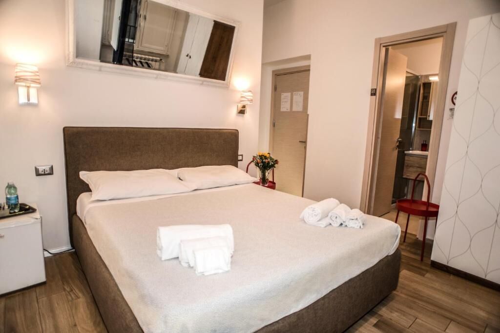 Deluxe Triple Room, Courtyard View | In-room safe, iron/ironing board, free WiFi