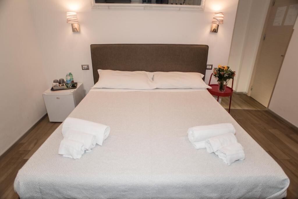 Deluxe Quadruple Room, Courtyard View | In-room safe, iron/ironing board, free WiFi