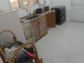 Family Triple Room, Pool View | Private kitchen | Microwave, oven, cookware/dishes/utensils - Kahawa sun set view kiwengwa  (Zanzibar)