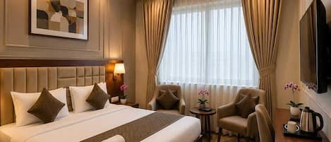 Chambre Deluxe double, vue sur la ville | Fer et planche Ă repasser, accĂšs au Wi-Fi (inclus)