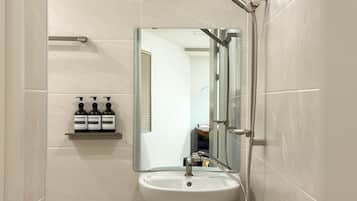Grand Triple Room, Non Smoking, Corner | Bathroom | Shower, hair dryer, towels, soap