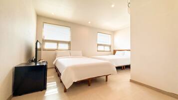Chambre Triple Supérieure, non-fumeur, vue plage