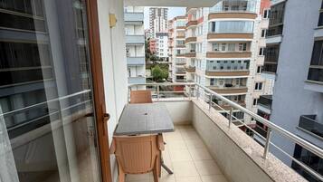 Triple Room, Balcony | Outdoor dining