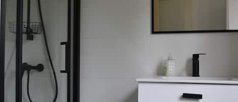 Shower, hair dryer, towels, soap