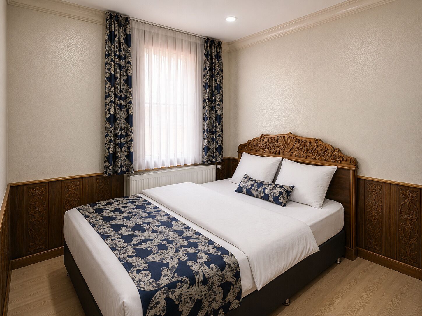 A bedroom with a large bed, a wooden headboard, and a window with curtains.