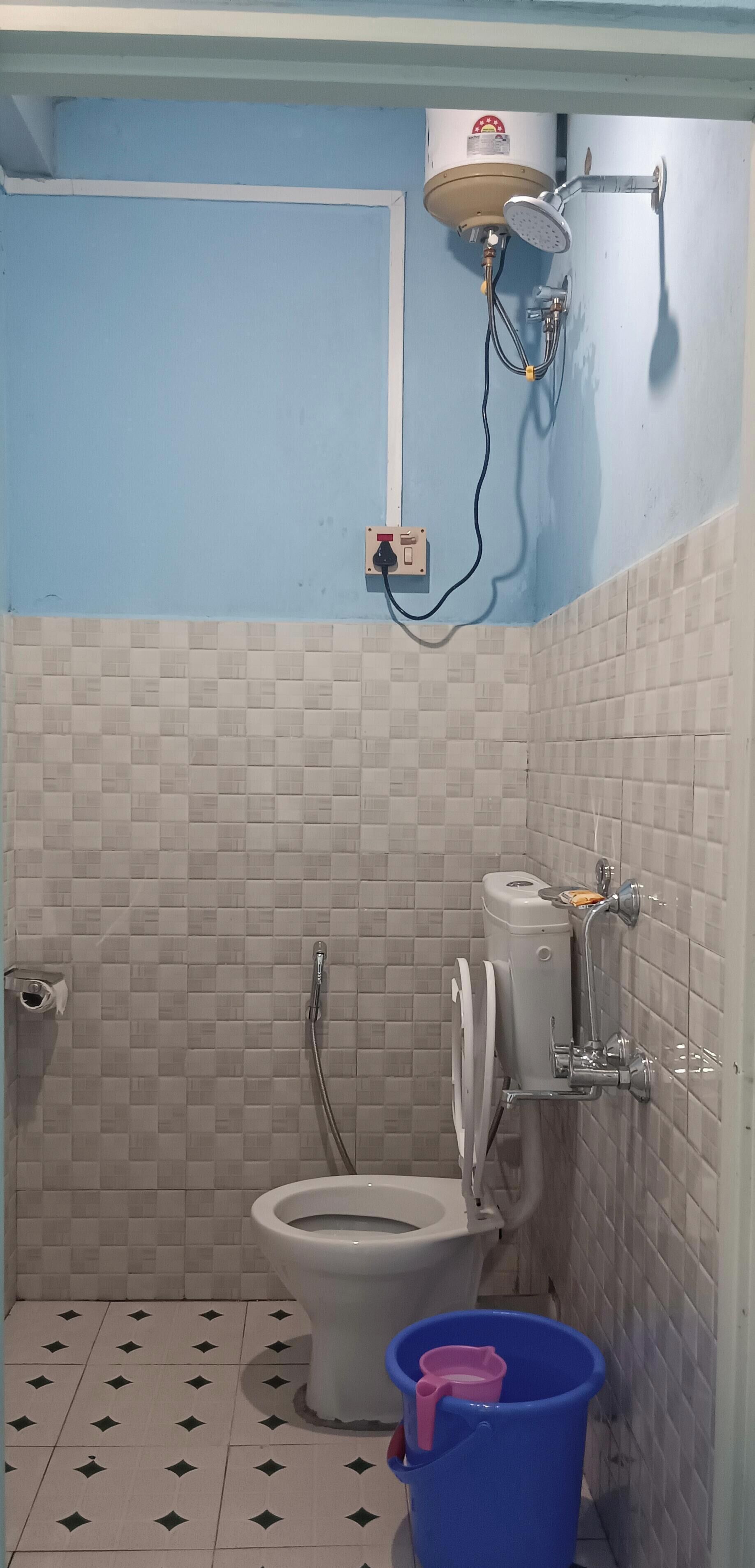 Shower, towels, soap, toilet paper