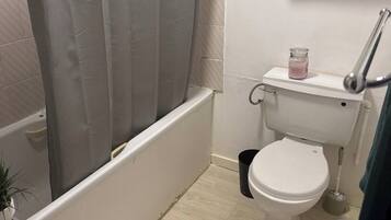 Hair dryer, bidet, towels, soap