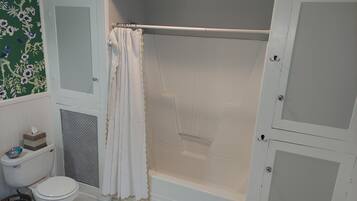 Hair dryer, towels, soap, toilet paper