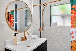 Shower, hair dryer, towels, soap