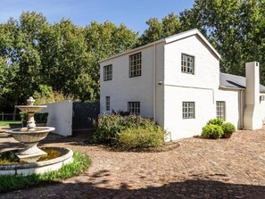 Deluxe cottage, patio, uitzicht op tuin | Exterieur