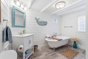 Shower, hair dryer, towels, shampoo