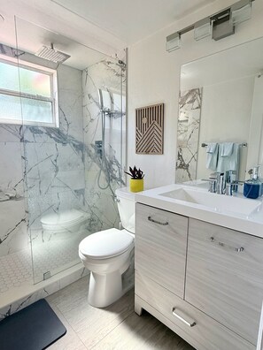 Shower, eco-friendly toiletries, hair dryer, towels - Relaxing Coastal Escape Steps from Beach with Private Patio (Cape Canaveral)