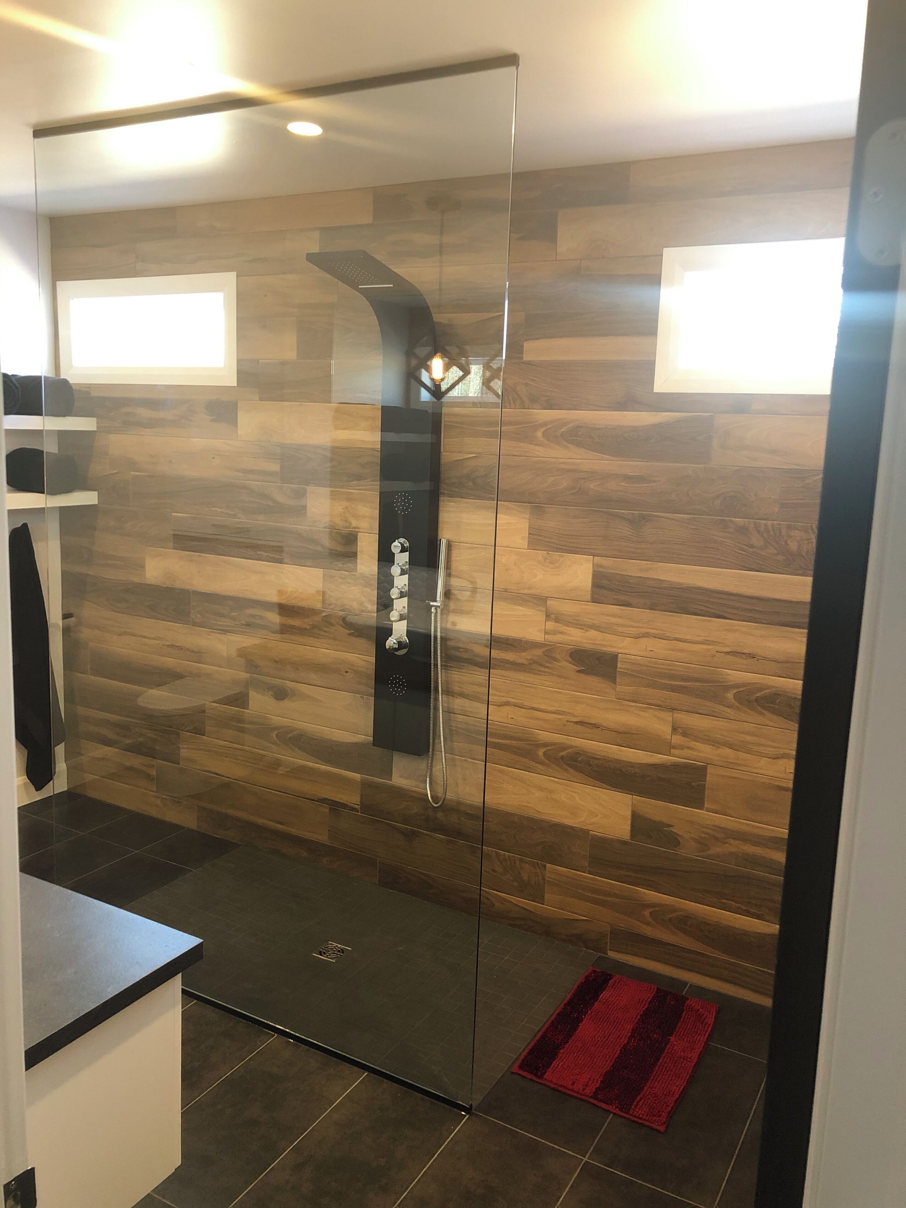 Shower, hair dryer, towels, toilet paper