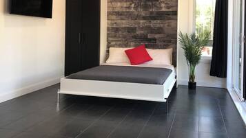 2 dormitorios, tabla de planchar con plancha, Internet y ropa de cama