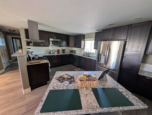 Fridge, microwave, oven, stovetop - Modern 3BR, 2BTH | Hot Tub, Patio & Prime Location (Boise)