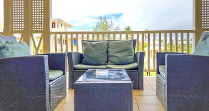 Chic casual ocean themed condo located in Tobago 's most exclusive compound .