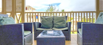 Chic casual ocean themed condo located in Tobago 's most exclusive compound .