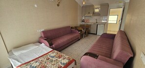Family Apartment, Balcony, Pool View | Living area - GAZİPASA STAR OTEL (Antalya)
