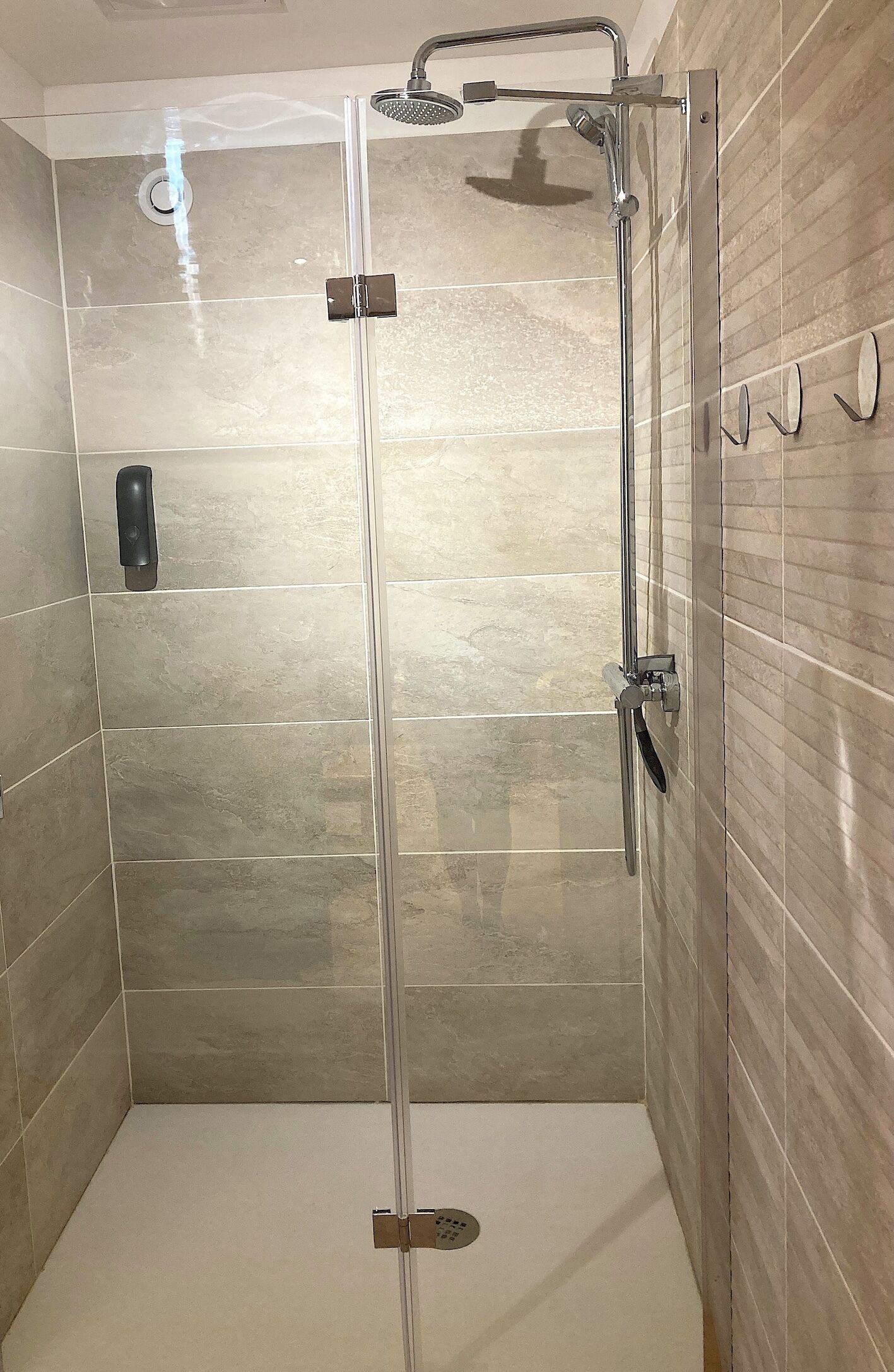 Shower, eco-friendly toiletries, hair dryer, towels