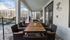 Outdoor dining - 8BR Villa with Pool, Spa, Theater & Game Room (champions gate)