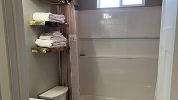 Hair dryer, towels, soap, toilet paper