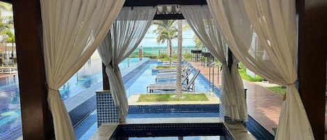 Outdoor pool, pool umbrellas, pool loungers