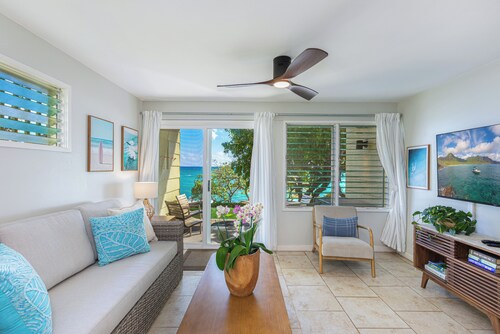 RIGHT ON THE BEACH! Renovated oceanfront two bed townhouse on Kapaa's best beach