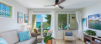 RIGHT ON THE BEACH! Renovated oceanfront two bed townhouse on Kapaa's best beach