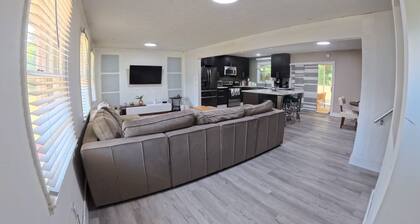 3-bedroom 2 Bath house in soothing Riverdale with AC and screened patio deck.