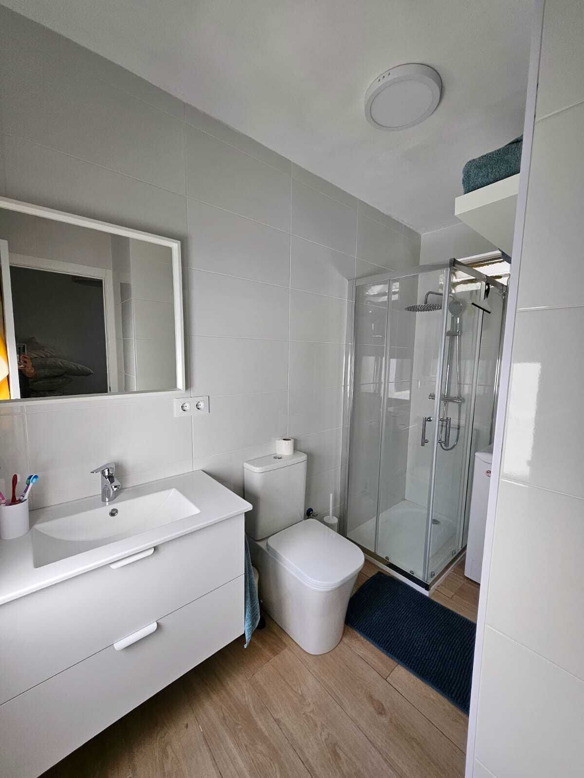 Shower, towels, toilet paper