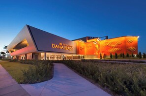 A modern building with a prominent sign reading 'The Casino of Dania Beach.' - Large Private Villa with Pool, Sauna, Billiards, Minutes from the Beach (Dania Beach)