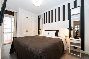 Apartamento superior, sacada | Ferros/tábuas de passar roupa, Wi-Fi de cortesia