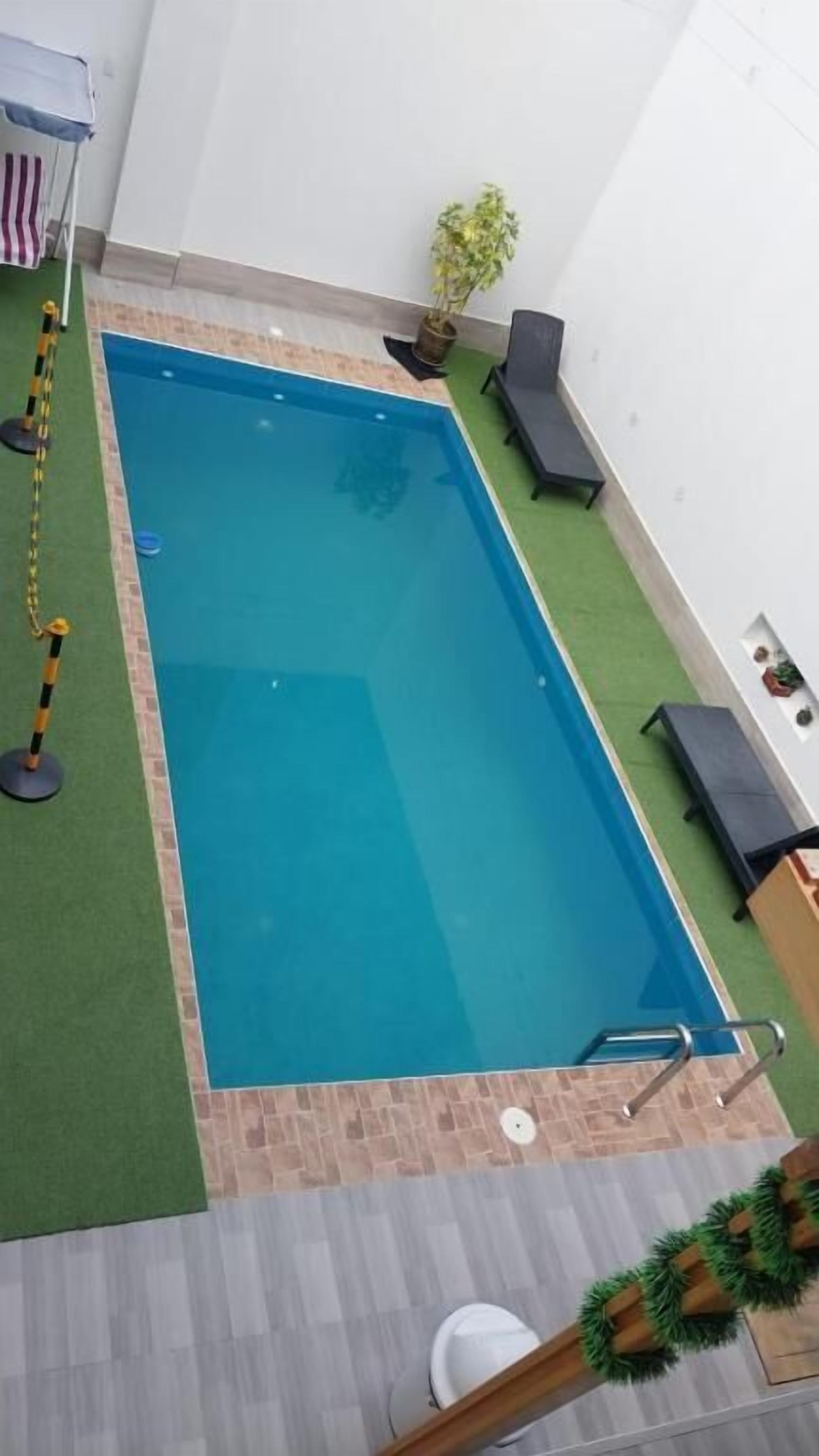 Family Room, Balcony, Garden View | Pool