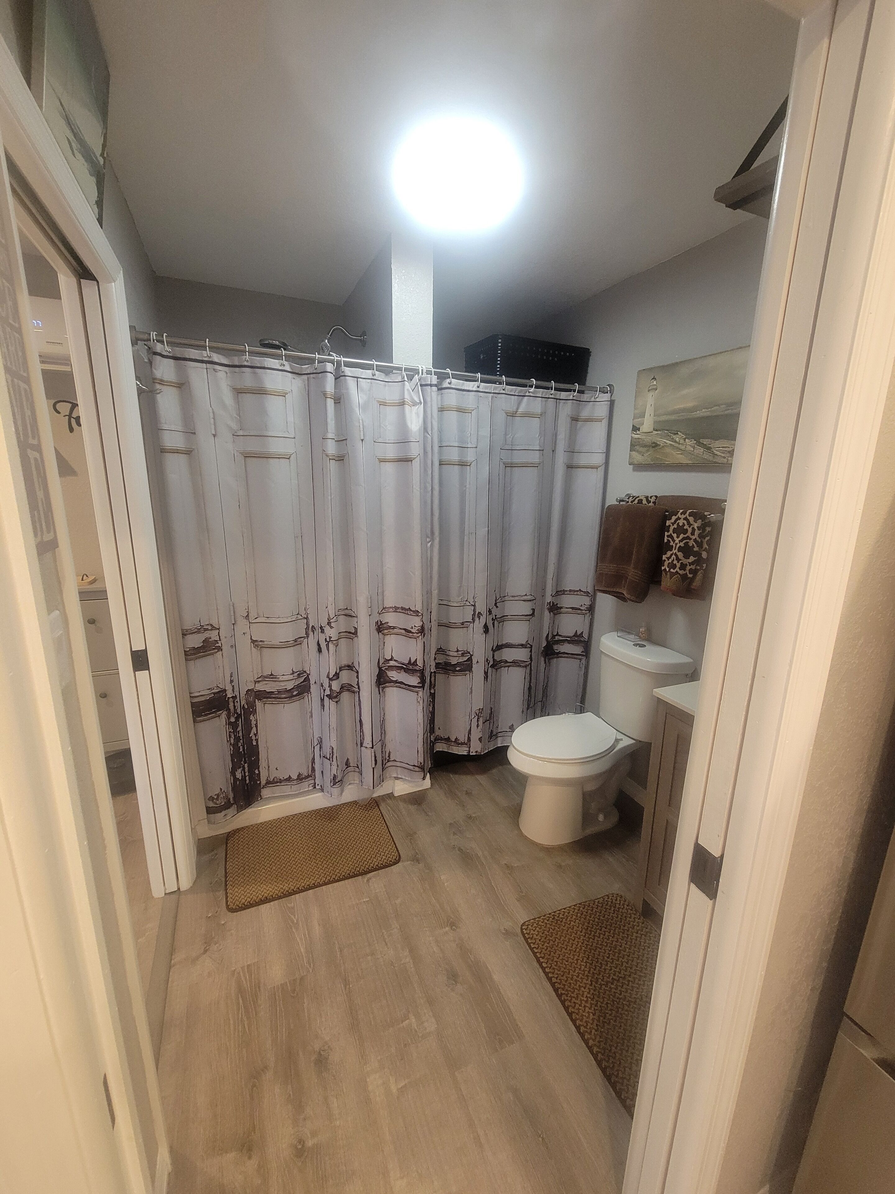 Shower, hair dryer, towels