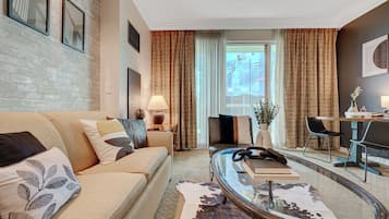 Junior Studio Suite, Kitchenette, City View | Living area | 42-inch flat-screen TV with cable channels