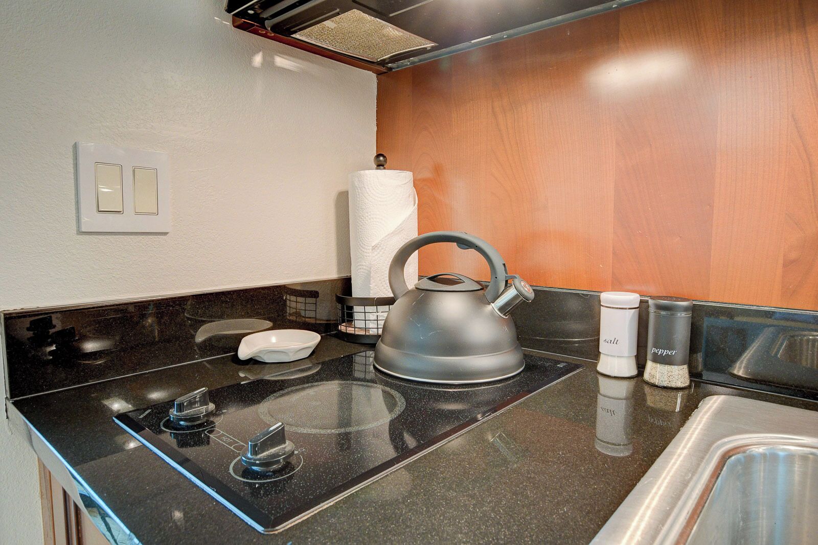 Mini-fridge, microwave, stovetop, coffee/tea maker