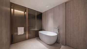 Superior Suite, City View | Bathroom | Shower, rainfall showerhead, free toiletries, hair dryer