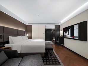 Premium bedding, down duvets, memory-foam beds, free minibar