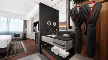 Premium bedding, down duvets, memory-foam beds, free minibar