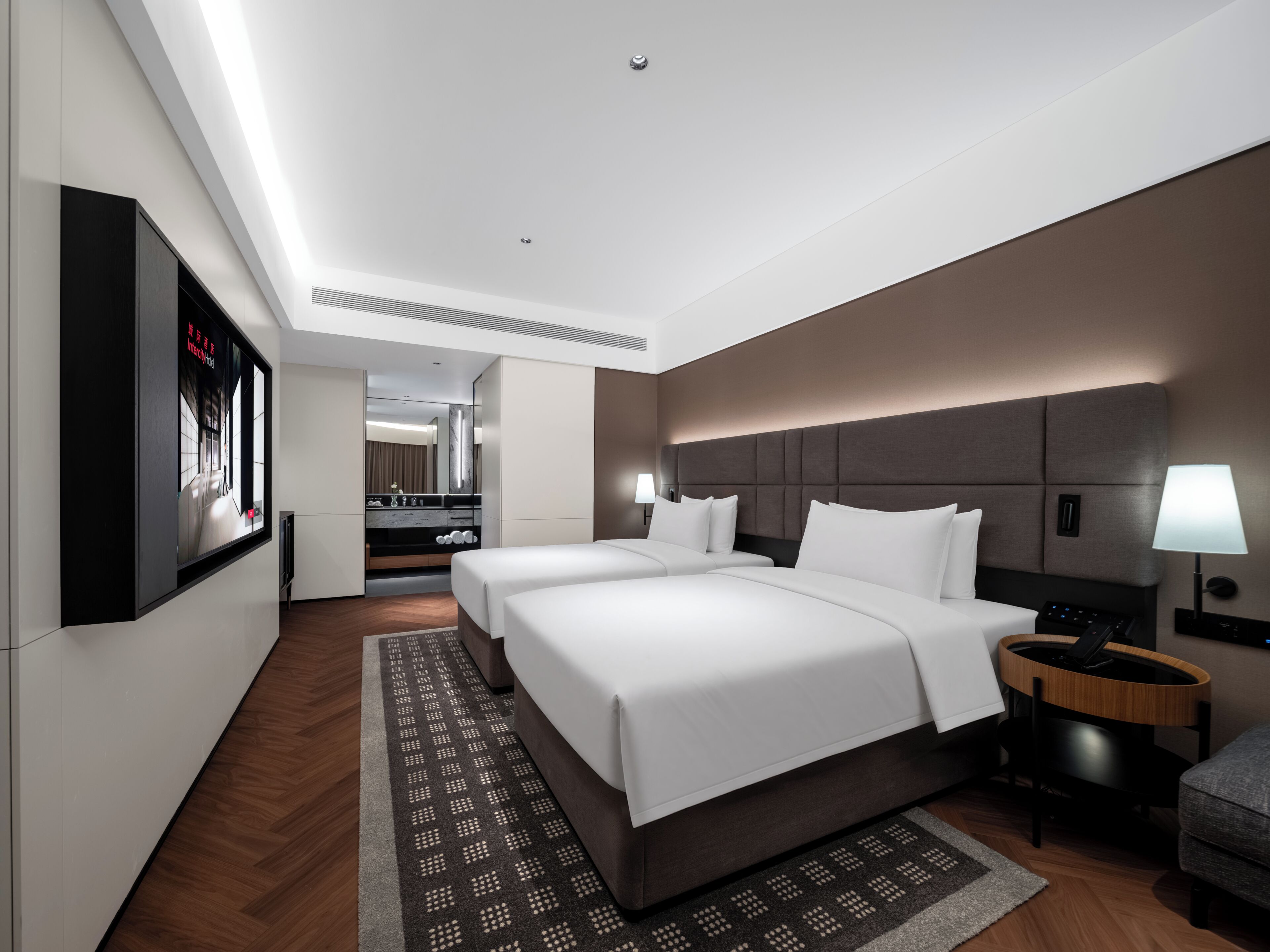 Premium bedding, down duvets, memory-foam beds, free minibar